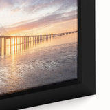 Close-up view of a framed canvas wall art piece depicting a serene landscape with bridges, showcasing vibrant colors and intricate details, ideal for home decor.