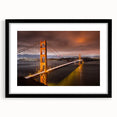 Framed wall art featuring a scenic landscape with a bridge design, presented in a sleek black frame with a mat, ideal for enhancing home décor and inspiration.