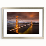 Framed wall art featuring a serene landscape with a bridge, enhanced by a silver mat and frame, perfect for home decor and interior design enthusiasts.