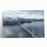 Stretched canvas wall art featuring a serene landscape scene with a bridge over a calm river, showcasing vibrant colors and natural details, perfect for home decor.