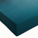 Close-up of a stretched canvas wall art featuring a vibrant landscape with intricate bridge designs, showcasing rich colors and textures ideal for home decor.