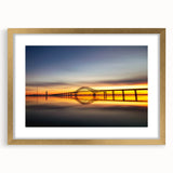 Elegant framed wall art collection showcasing a stunning landscape bridge design, featuring a gold mat and frame, perfect for enhancing home decor with a touch of sophistication.