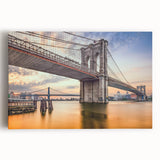 Stretched canvas artwork depicting a vibrant landscape featuring a scenic bridge over a tranquil river, ideal for home decor or office spaces.
