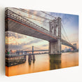 Stretched canvas wall art depicting a serene landscape with a bridge over a tranquil river, showcasing vibrant colors and natural beauty, perfect for home decor.