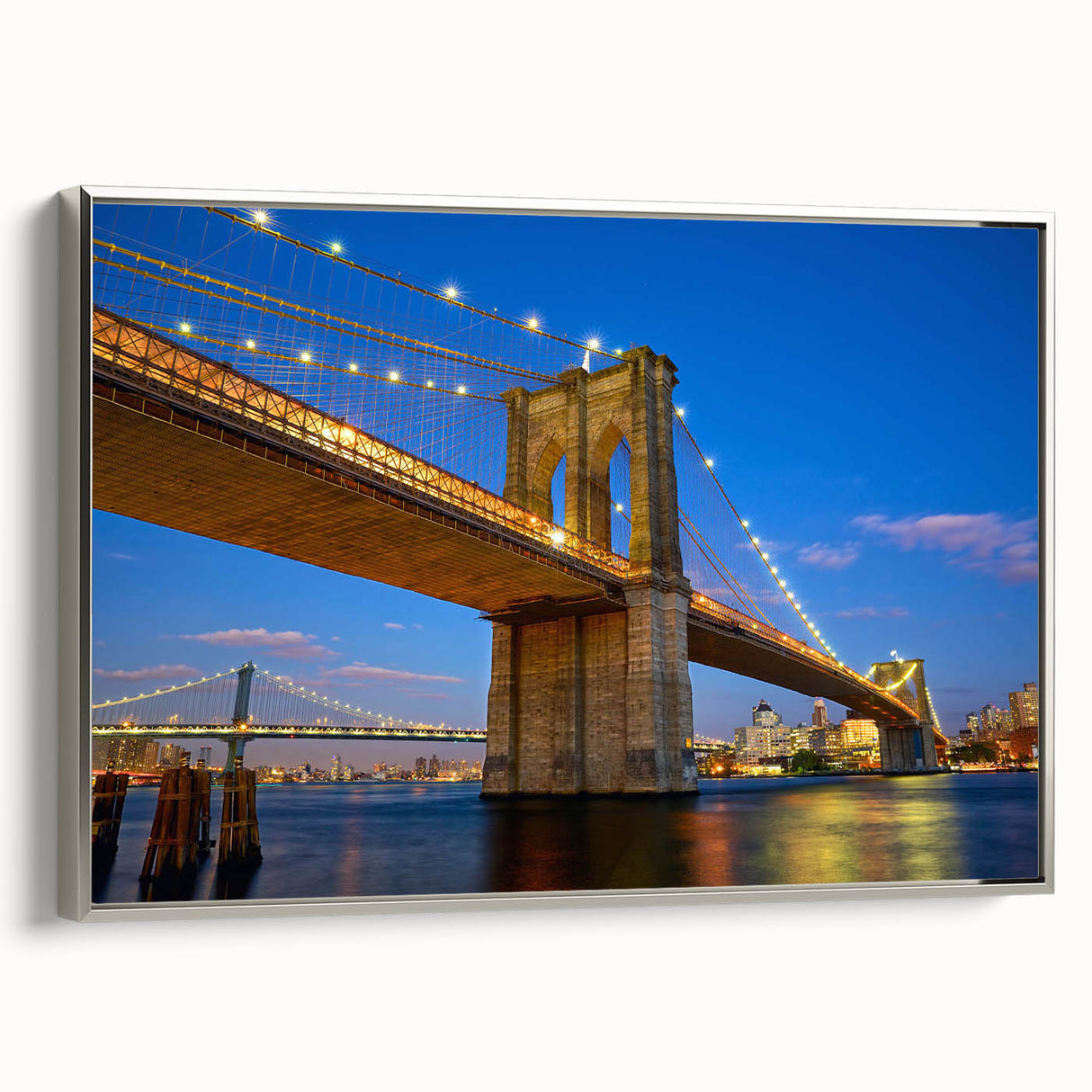 Framed canvas wall art depicting a serene landscape with a bridge, featuring silver accents and a modern design, perfect for home decor.