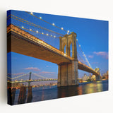 Stretched canvas artwork depicting a vibrant landscape with a bridge, featuring lush greenery and a serene sky, ideal for home decor or office settings.