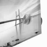 Close-up of a vibrant acrylic glass artwork depicting a serene landscape with a bridge, showcasing intricate details and colors, perfect for modern home decor.