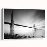Framed canvas wall art depicting a serene landscape bridge scene, featuring lush greenery and a bright blue sky, perfect for home decor.