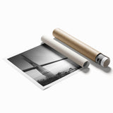 Scenic landscape wall art print showcasing a picturesque bridge surrounded by lush greenery, rolled up in a protective cardboard tube for easy display.