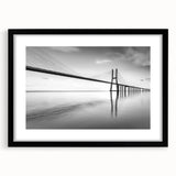Black-framed wall art featuring a serene landscape with a picturesque bridge, designed for home decor. The mat adds elegance, enhancing any interior space.