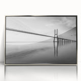 Framed acrylic wall art showcasing a stunning landscape featuring a bridge, designed in silver tones. This decorative piece adds elegance to any interior space, perfect for modern decor enthusiasts.