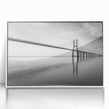 Framed acrylic wall art featuring a scenic landscape with a bridge, showcasing vibrant colors and intricate details, perfect for home or office decor.