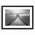 Framed wall art featuring a black mat and a scenic landscape bridge design, showcasing vibrant colors and intricate details, ideal for home decor enhancement.