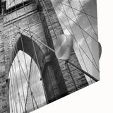 Close-up of a vibrant acrylic glass wall art piece showcasing a detailed landscape bridge design, perfect for modern home decor, emphasizing color and texture.