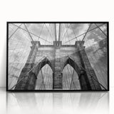 Framed acrylic wall art featuring a scenic landscape with a bridge design, presented in a sleek black frame. Ideal for modern home decor, enhancing any living space.