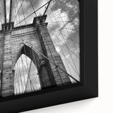 Framed canvas wall art showcasing a vibrant landscape with a bridge, highlighting intricate details and rich colors, perfect for home decor enhancement.