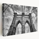 Stretched canvas wall art showcasing a serene landscape with a bridge over a tranquil river, featuring vibrant colors and intricate details, ideal for home decor.