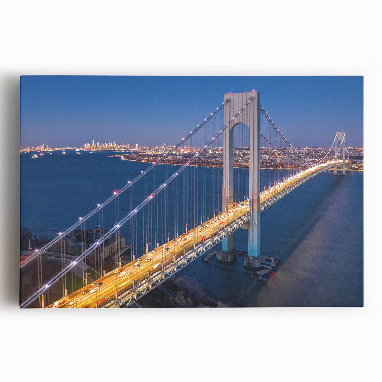 Stretched canvas wall art depicting an intricate landscape scene featuring a serene bridge over a tranquil river, surrounded by lush greenery and vibrant colors, perfect for home decor.