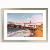 Framed wall art showcasing a serene landscape with a bridge, featuring a silver mat and modern design, perfect for enhancing home décor aesthetics.