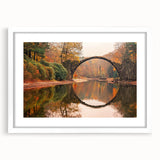 Framed wall art collection featuring a serene landscape with a bridge, presented in a white mat and frame, ideal for home decor and interior design aesthetics.