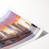 Rolled canvas print showcasing a vibrant landscape bridge design, featuring rich colors and intricate details, elegantly packaged in a protective cardboard tube.