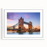 Framed wall art featuring a serene landscape with a bridge, displayed in a white mat and frame, perfect for enhancing home decor and adding a calming touch.