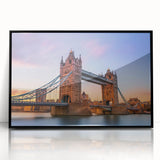 Framed wall art featuring a modern landscape design with a bridge, presented in a sleek black frame, ideal for enhancing contemporary home decor.