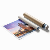 A rolled print showcasing a stunning landscape bridge design, featuring vibrant colors and intricate details, perfect for home decor or art collection.