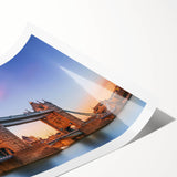 Vibrant rolled print showcasing a serene landscape with a modern bridge, perfect for home decor, packaged securely in a protective cardboard tube.