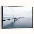 Framed canvas wall art showcasing a serene landscape with a bridge, featuring a modern black frame. Ideal for enhancing home decor with nature-inspired themes.