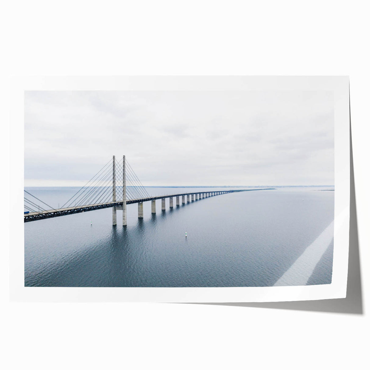 Vibrant landscape wall art featuring a serene bridge over a tranquil river, showcasing lush greenery and a clear blue sky, perfect for home decor enhancement.