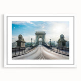 Framed wall art collection featuring a serene landscape with bridges, encased in a white mat and sleek frame, perfect for enhancing home decor aesthetics.