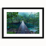 Framed wall art featuring a serene landscape with a bridge, set in a stylish black frame and matting, ideal for enhancing modern home decor.