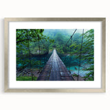Framed wall art showcasing a serene landscape with a bridge, featuring a silver mat and sleek frame. Ideal for home decor to add elegance and tranquility to any space.