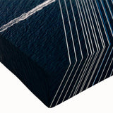 Close-up of a stretched canvas wall art piece showcasing a vibrant landscape with intricate bridge designs, ideal for modern home decor and interior styling.