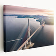 Stretched canvas wall art showcasing a serene landscape with a modern bridge, featuring vibrant colors and intricate details, perfect for home decor.