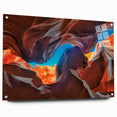 Acrylic glass wall art display showcasing a vibrant canyon landscape design, featuring rich colors and intricate details, creatively mounted with decorative pins.