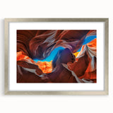 Framed wall art showcasing a stunning canyon landscape design, featuring a silver frame and a white mat, ideal for enhancing modern home decor.