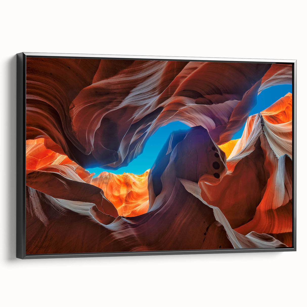 Framed wall art showcasing a stunning landscape canyon design, featuring rich earthy tones and a sleek black frame, ideal for modern home decor.