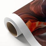 Vibrant rolled canvas artwork showcasing a stunning canyon landscape in rich earthy tones, perfect for home decor, packaged securely in a protective tube.