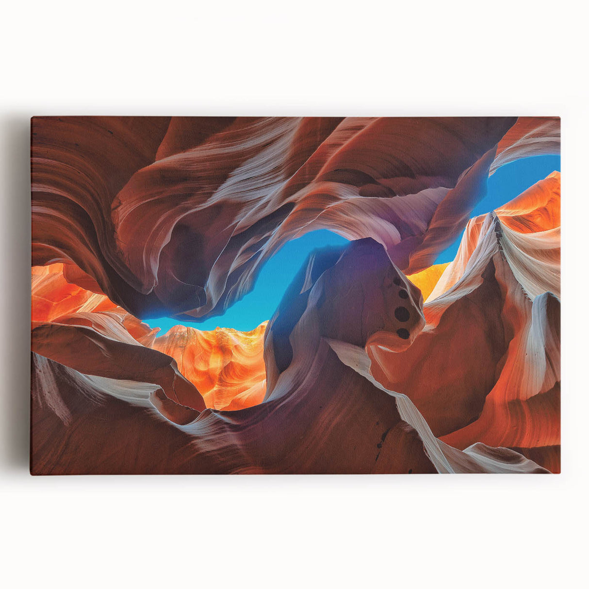 Stretched canvas wall art showcasing vibrant canyon landscapes in warm tones, perfect for home decor, enhancing living spaces with nature-inspired beauty.