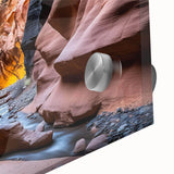 Close-up of a stunning acrylic glass wall art piece showcasing vibrant landscapes and canyons in rich colors, ideal for enhancing modern home decor.