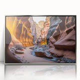 Framed wall art featuring a stunning canyon landscape design, with vibrant colors and a sleek silver frame, perfect for adding an artistic touch to any space.