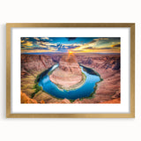 Framed wall art showcasing a stunning canyon landscape design, featuring a gold frame and mat, ideal for home decor and enhancing interior aesthetics.
