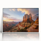 Framed acrylic wall art showcasing a stunning canyon landscape, featuring vibrant colors and intricate details, presented in a sleek white frame for modern decor.