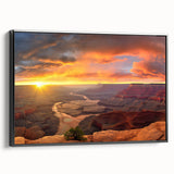 Framed canvas wall art depicting a stunning canyon landscape in warm earth tones, featuring intricate details and a sleek black frame, ideal for home decor.
