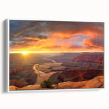 Framed canvas wall art showcasing a vibrant canyon landscape design with rich colors and intricate details, presented in a sleek white frame for an elegant finish. Perfect for enhancing home decor with a touch of nature-inspired beauty.