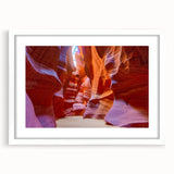 Framed landscape wall art showcasing a stunning canyon design in vibrant colors, accented by a white mat for a modern touch, ideal for home decor.