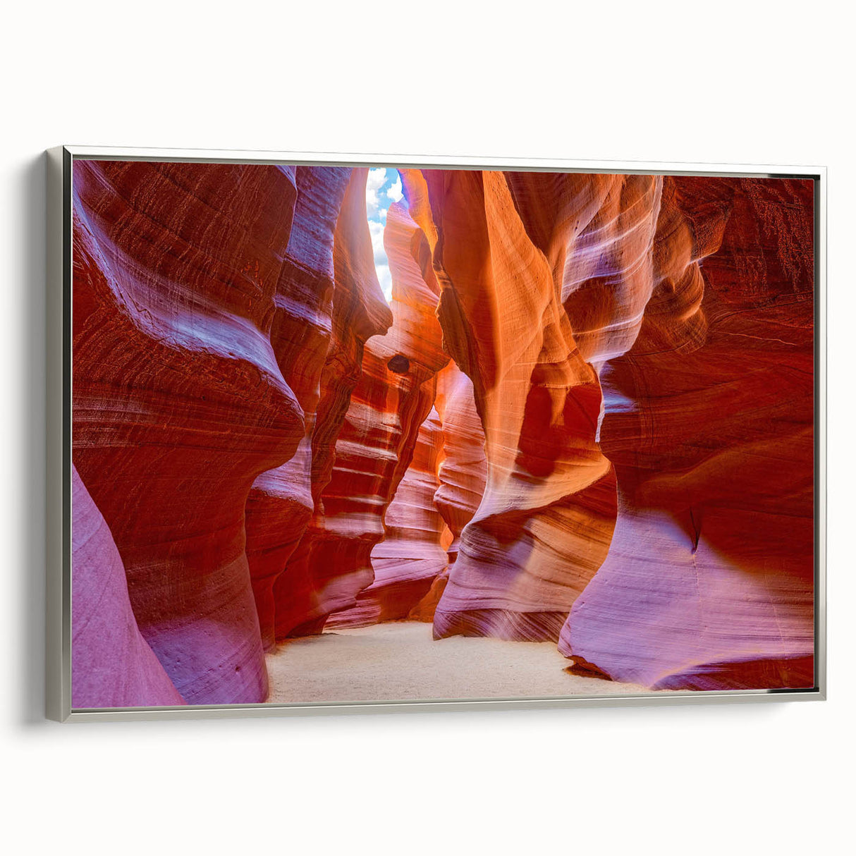 Framed canvas wall art showcasing a stunning canyon landscape design with vibrant colors and intricate details, featuring a sleek silver frame, ideal for home decor.