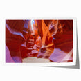 Vibrant rolled print showcasing a stunning canyon landscape with rich colors and intricate details, ideal for home decor or art enthusiasts, packaged securely in a protective tube.